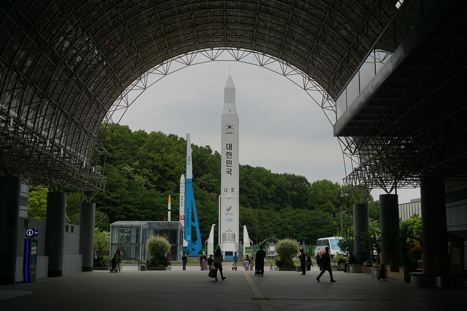 Tunnel between 2 buildings with a rocket at the end