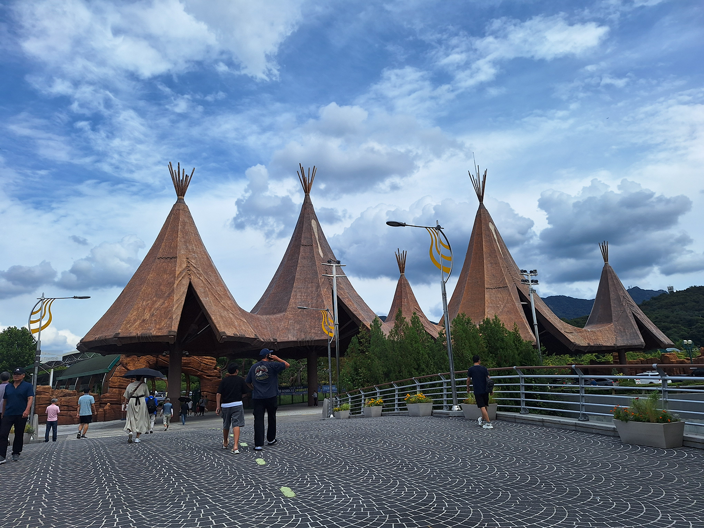 Teepee looking overhangs on the path outside the station