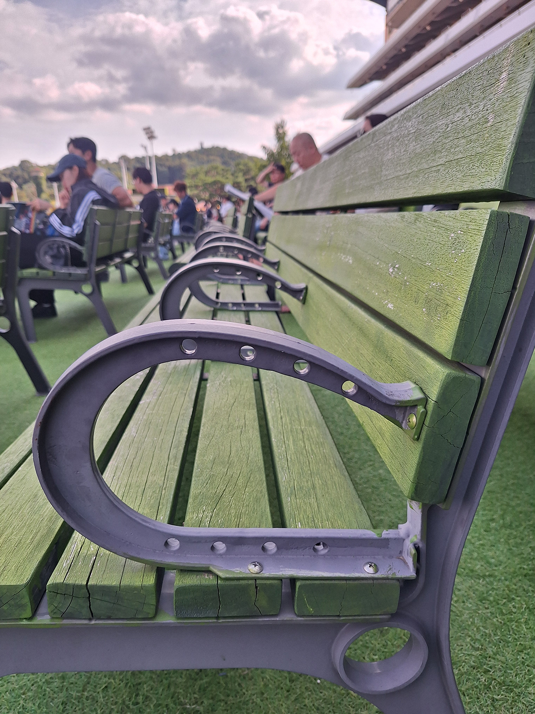 Normal Bench seating, except the armrests are shaped like horseshoes